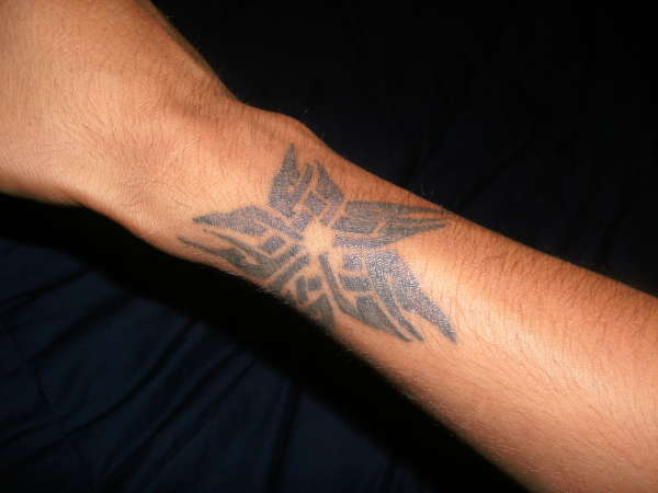 tribal star tattoo