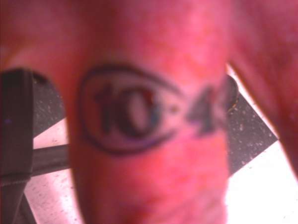 My hubbys wedding band tat tattoo