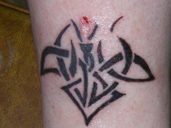 Tribal Rose tattoo