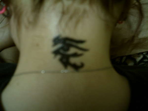 tribal eye tattoo