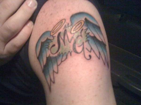 Angel wings for my boys tattoo