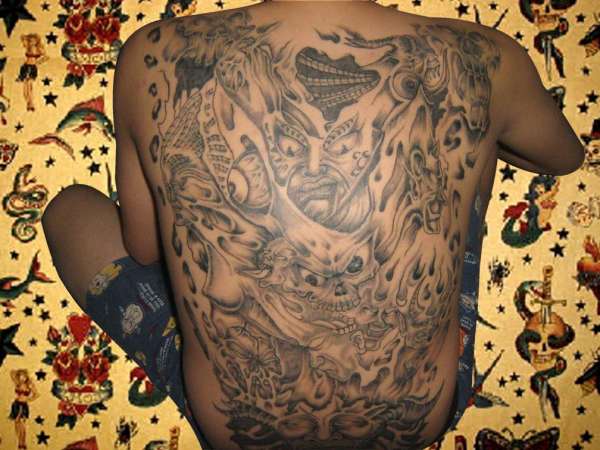 black and grey macabre tattoo