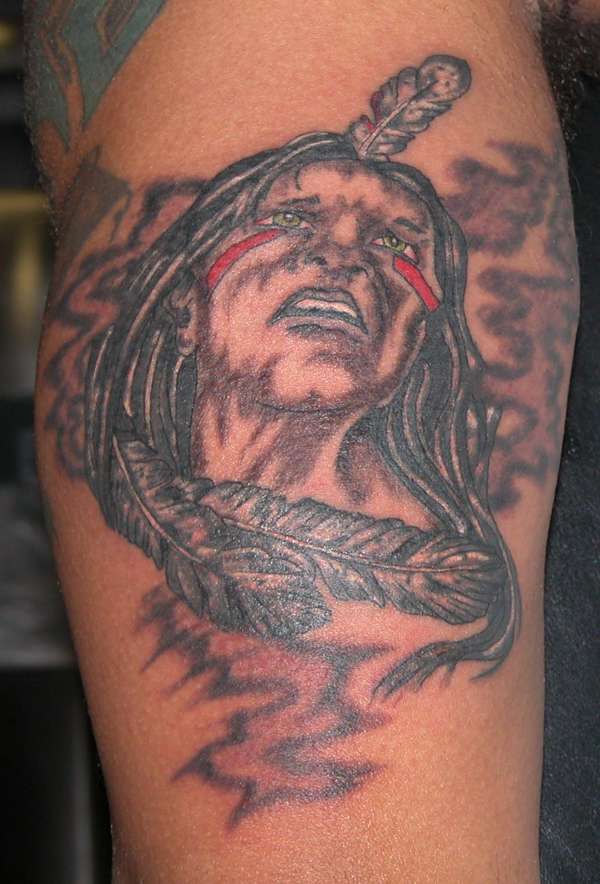 Indian with feathers tattoo