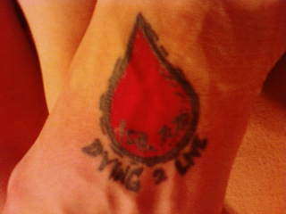 my Dying to Live Ministries blood drop/Isaiah 1:18 tat tattoo