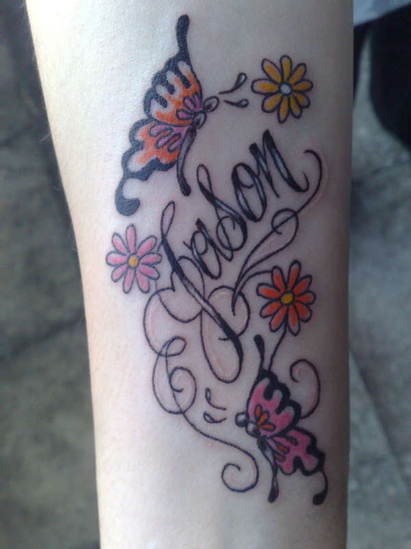 Jason with butterflies & flowers wrist tattoo