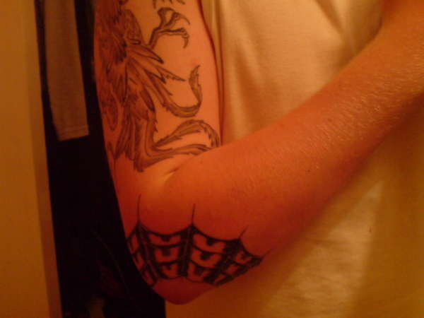 Spiderweb on Elbow tattoo
