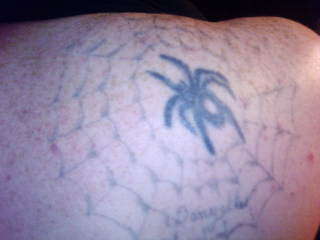 spider web/black widow/name tattoo