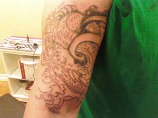 arm piece tattoo