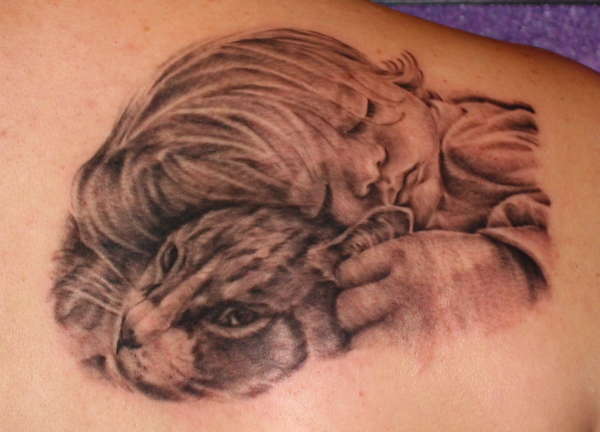 Baby with Kitty tattoo