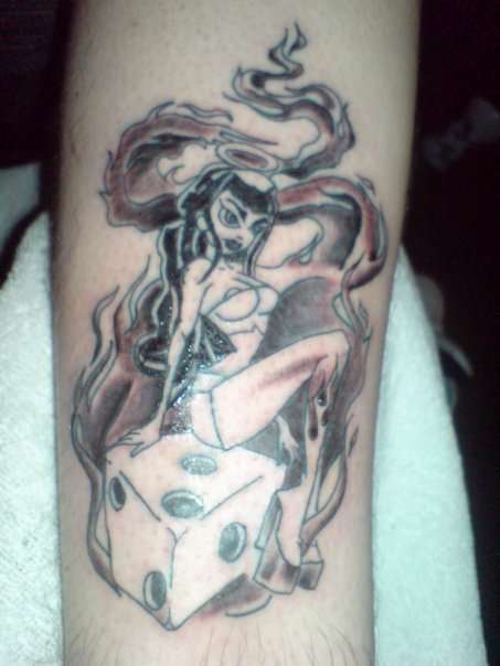 Black and grey pinup tattoo