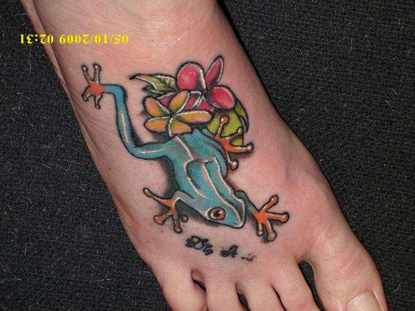 My sister n laws Frog tattoo on foot tattoo