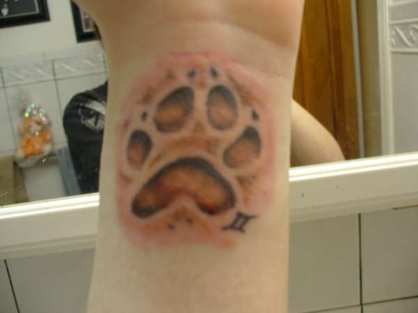 Wolf paw. tattoo