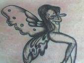 Naked fairy tattoo