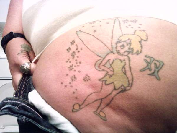 left thigh tat tattoo