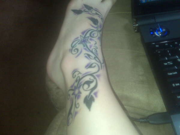 grape vines and stars tattoo