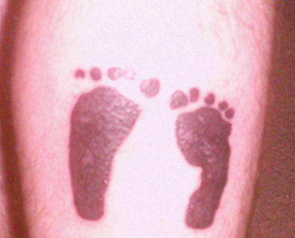 Foot prints tattoo