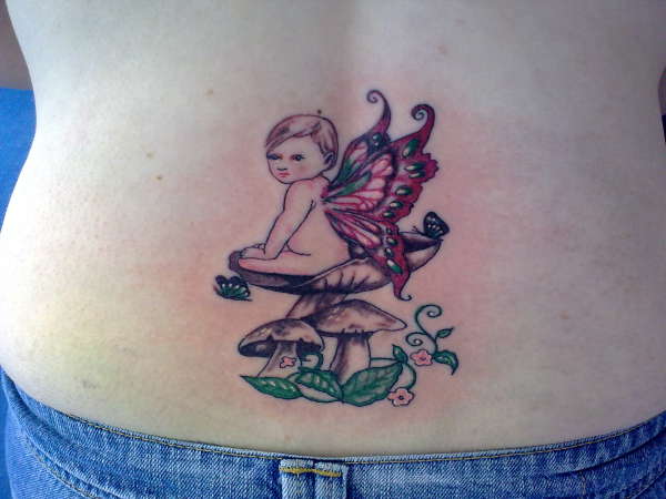 baby in toadstall tattoo