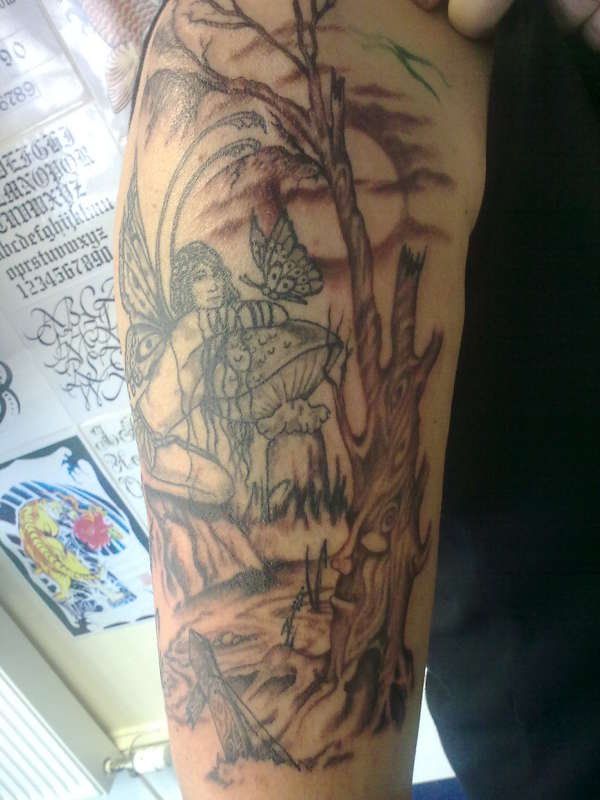 fairy and scenery tattoo