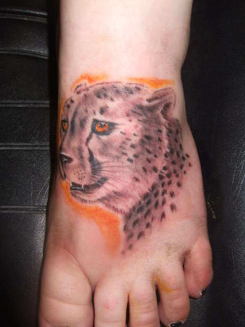 cheetah  on  foot tattoo