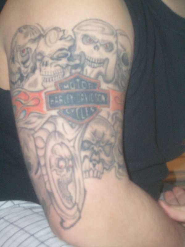 SHITLOAD OF SKULLS tattoo