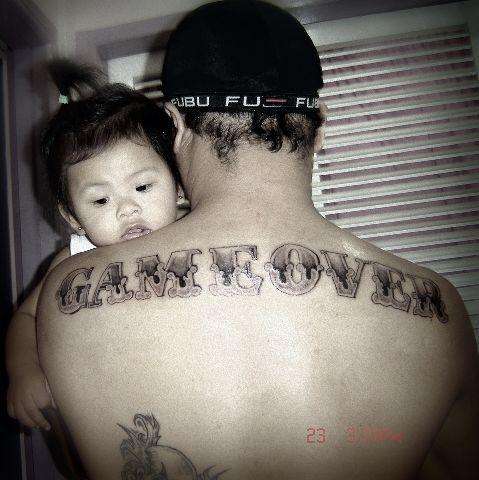 GAME OVER tattoo