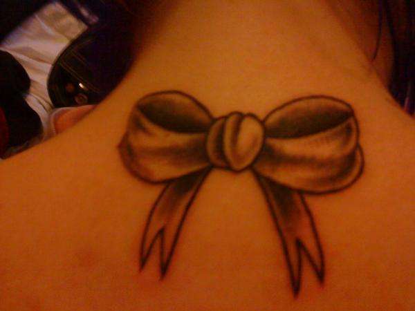 bow on back tattoo