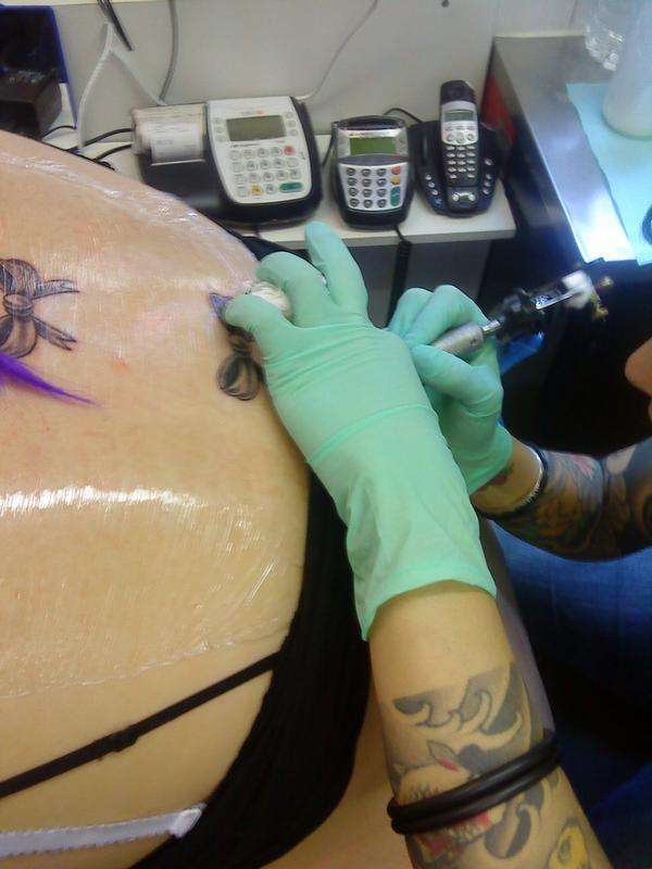 bows on back tattoo