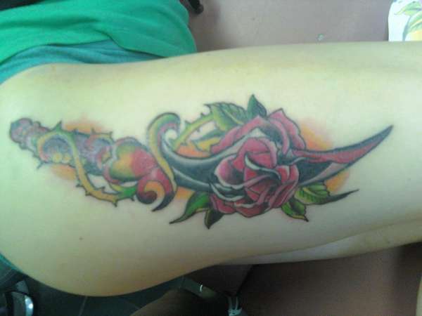 Traditional Rose with Knife tattoo