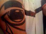 Adinkran God's Eye tattoo