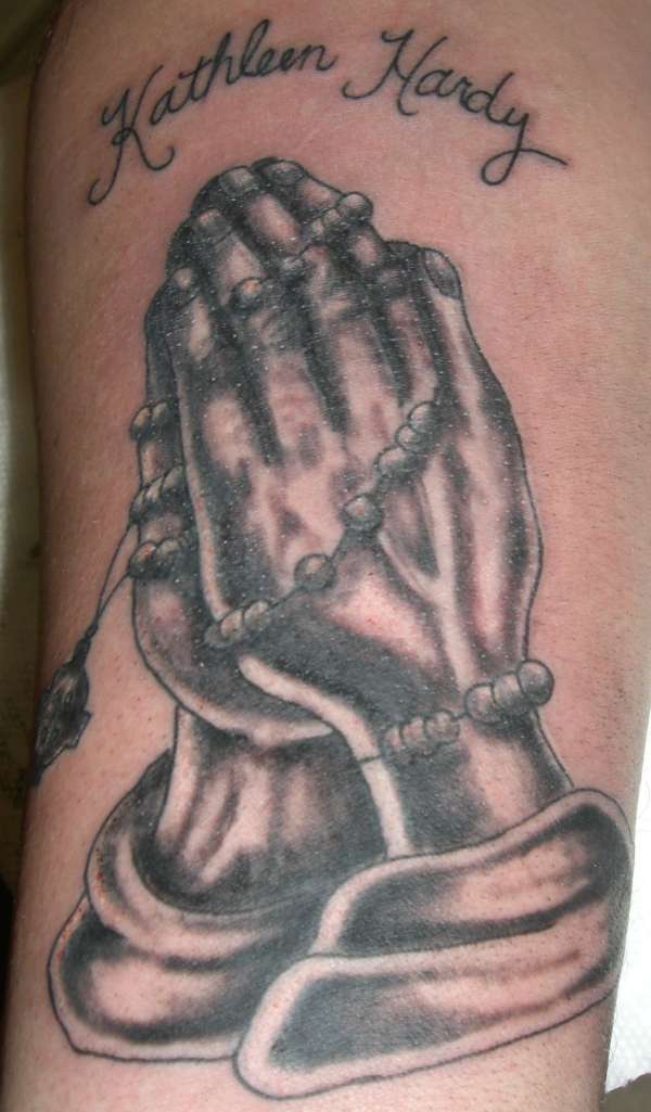 praying hands tattoo