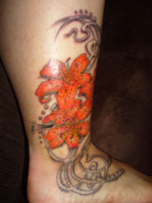 Tribal flowers tattoo