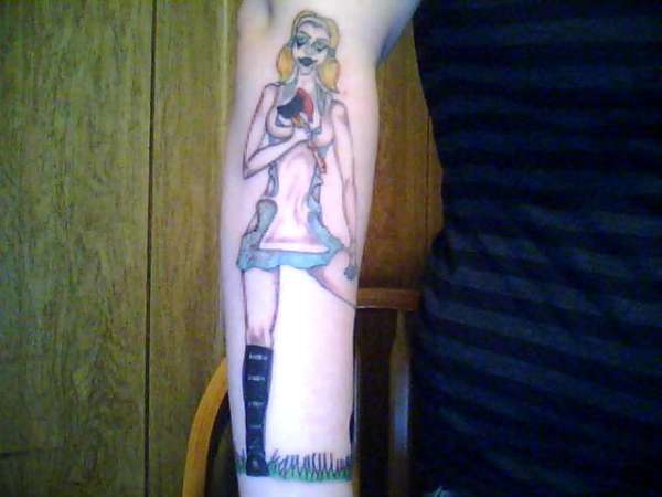 hatchet alice filled in right side tattoo