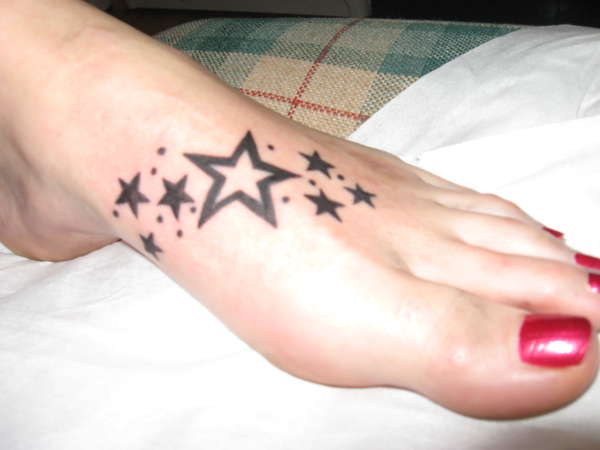 stars on foot tattoo