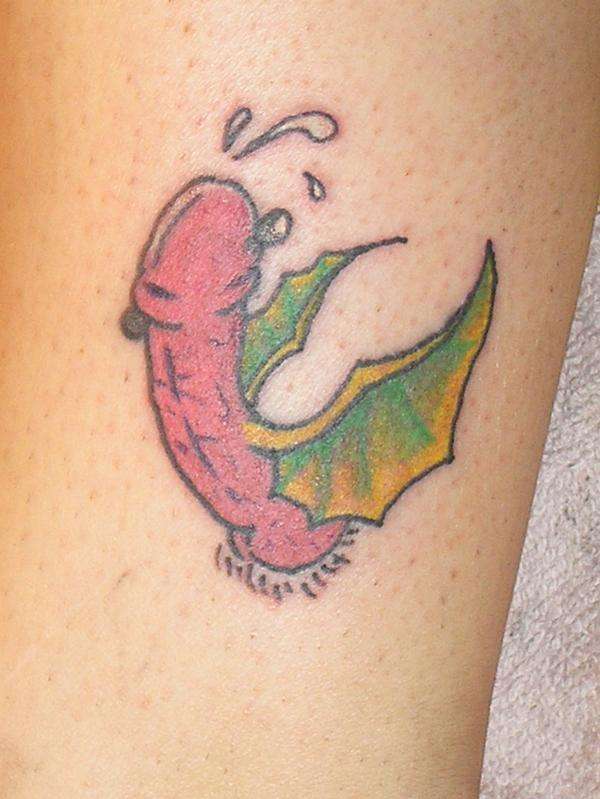 Flying penis tattoo