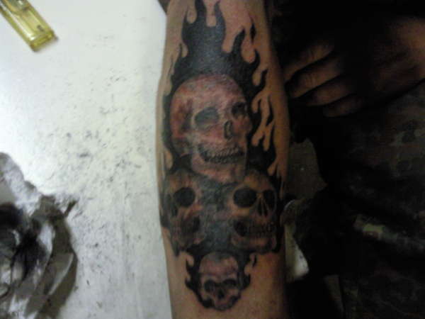 skulls in flames tattoo