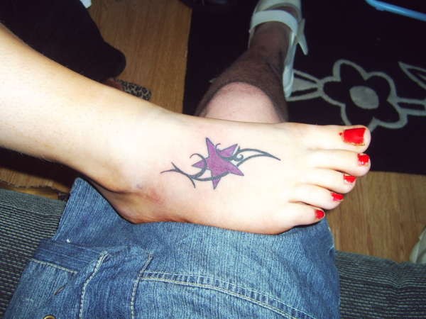 Star and tribal tattoo