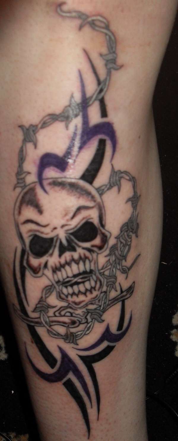skull w/ tribal and barb wire tattoo