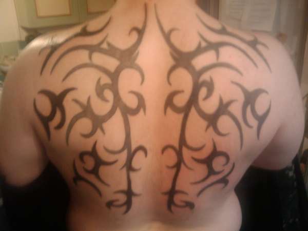 tribal back tattoo