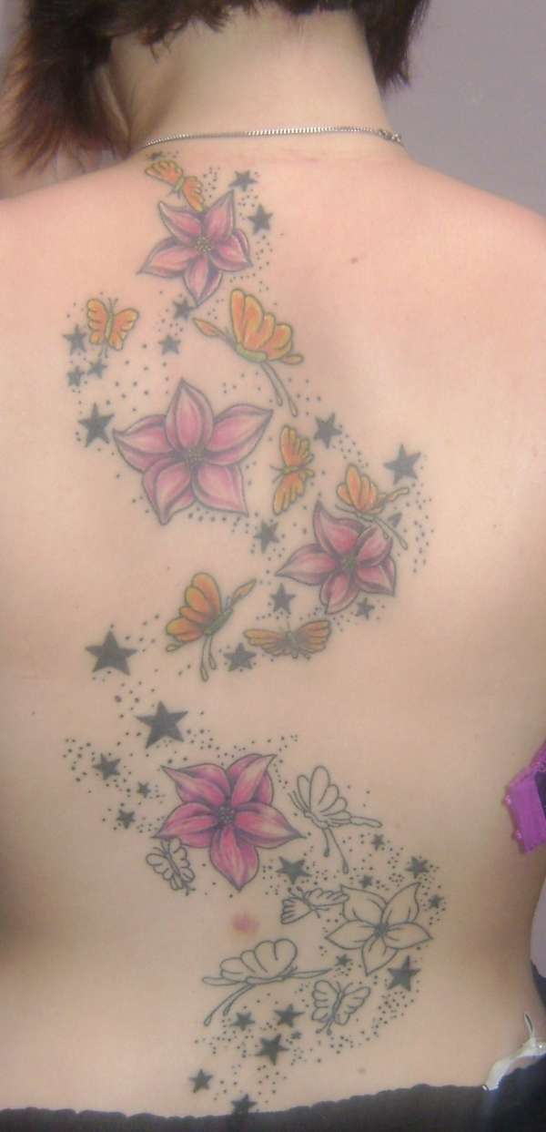 Stars, flowers and butterflies tattoo