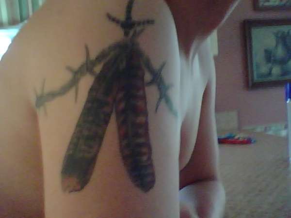 turkeynfeathers and barb wire tattoo