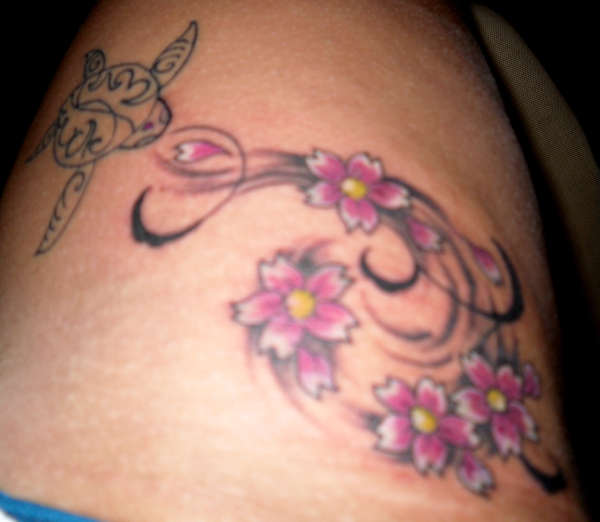 extended turtle with cherry blossom tattoo