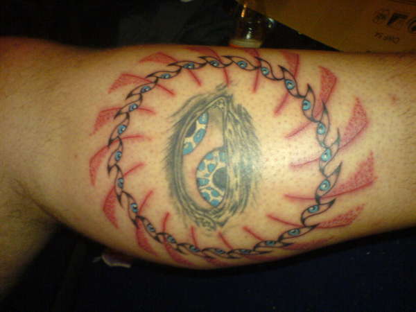 Third eye with surrounding tattoo