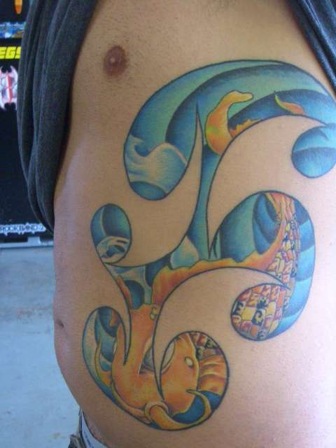 Tribal Koi tattoo