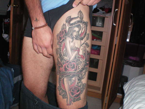 Snake, Pinup & Roses tattoo