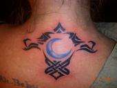 My Moms back of neck tattoo