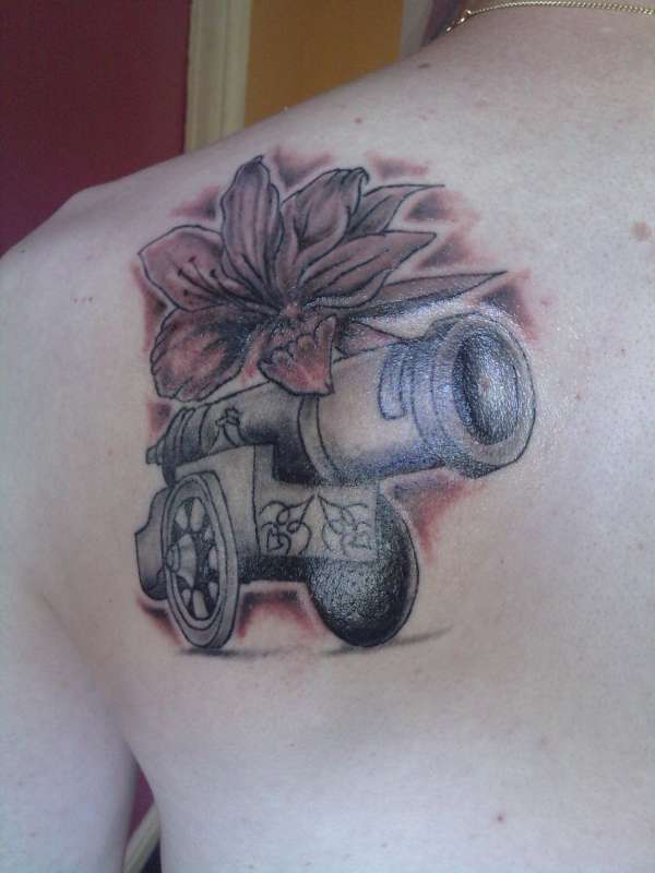 Lilly and Cannon shoulder tattoo tattoo