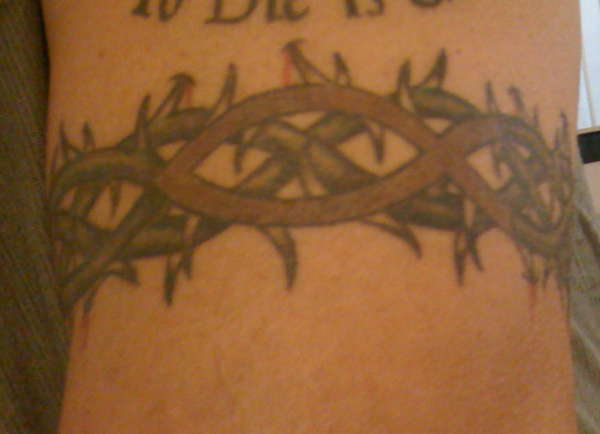 Crown of thorns arm band tattoo