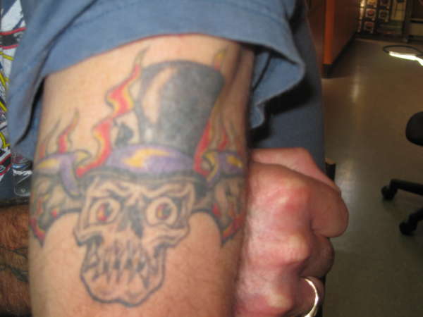 SKULL AND BAT WINGS tattoo