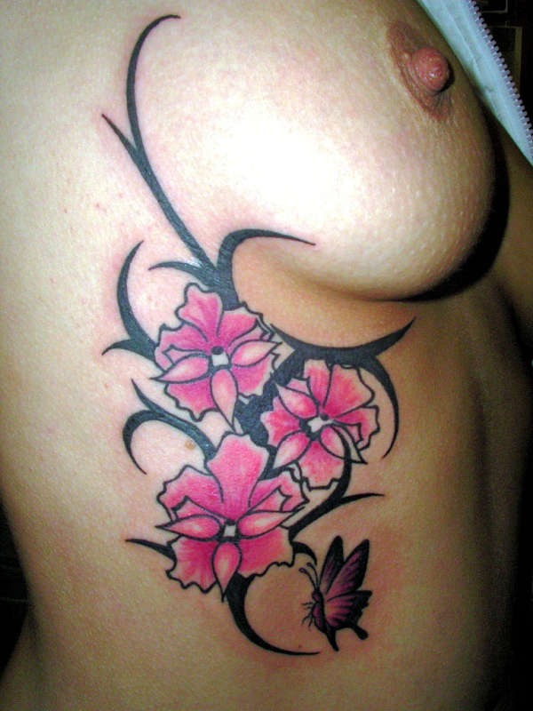 tribal + flowers tattoo