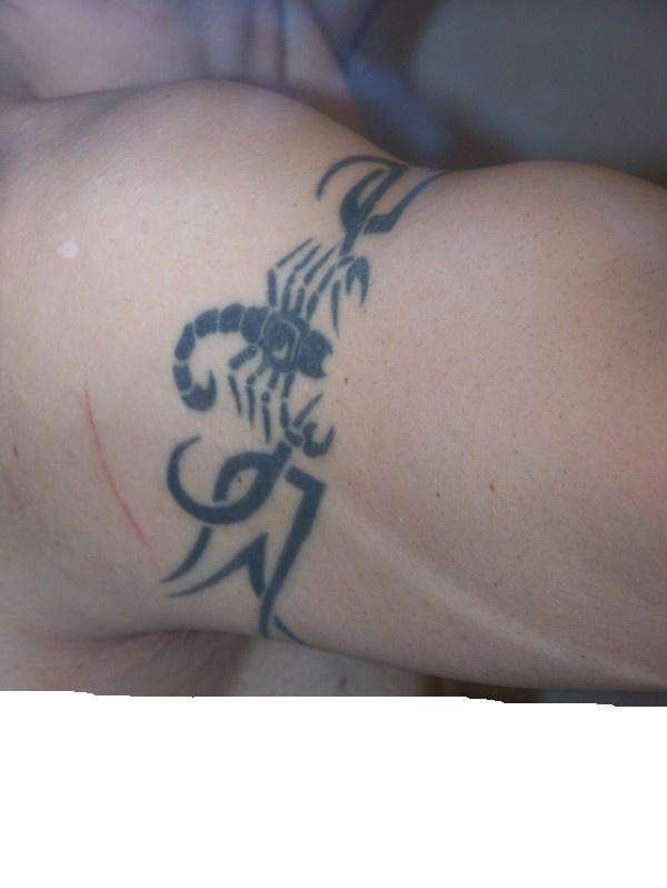 Tribal Scorpion tattoo